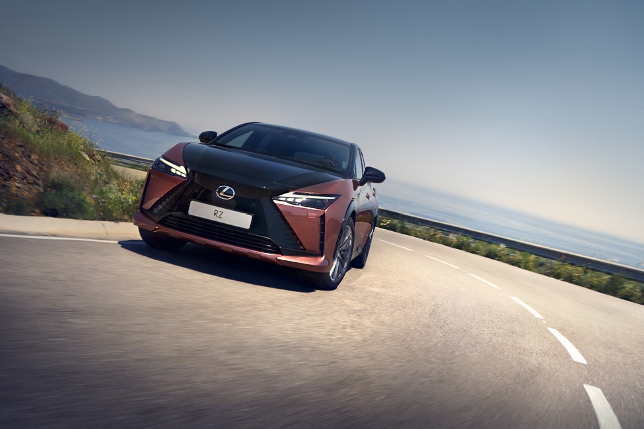 Lexus RZ driving on a mountainous road